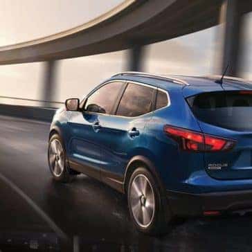2019-Nissan-Rogue-Sport-rear-angle-driving-on-highway