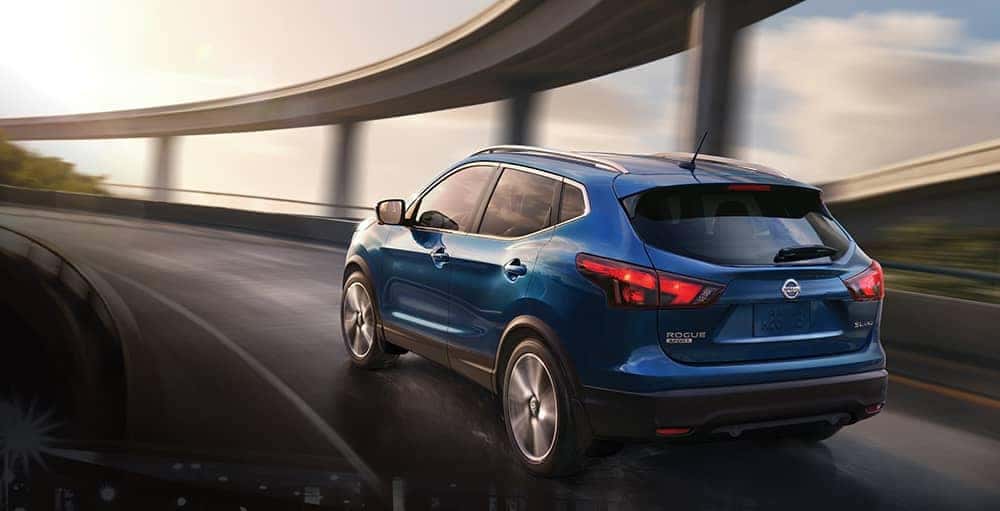 2019-Nissan-Rogue-Sport-rear-angle-driving-on-highway