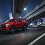2023 Chevy Tahoe in red, on the road in Crestview, FL