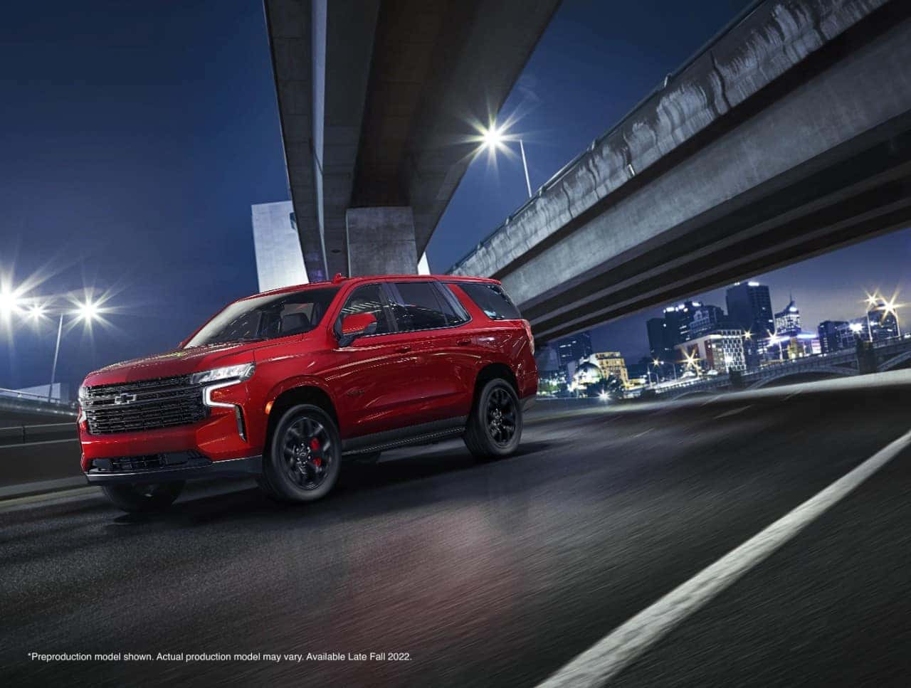 2023 Chevy Tahoe in red, on the road in Crestview, FL