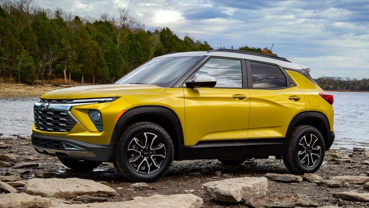 2024 Chevy Trailblazer near a lake and a wooded area