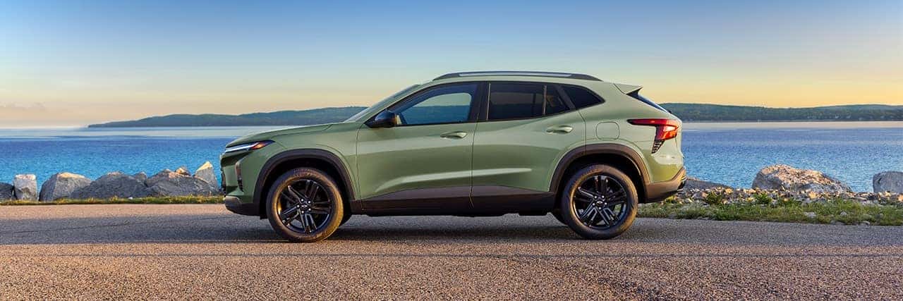 The Chevy Trax in green, parked by a body of water near Crestview, FL