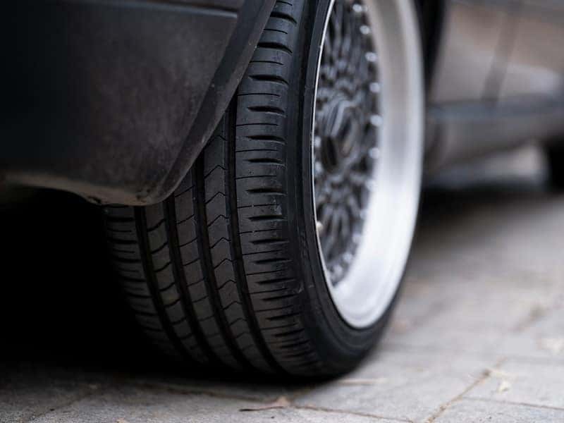 a close up of a tire on a car