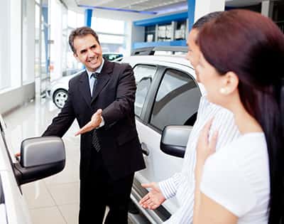 Couple buying a car