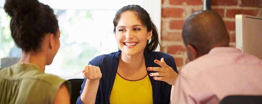 Couple Meeting With Finance Woman
