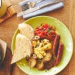 Early meal with fried eggs served with coffee