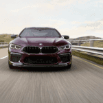 2023 BMW M8 Gran Coupe speeding down the road