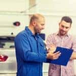 Mechanic talking to a client