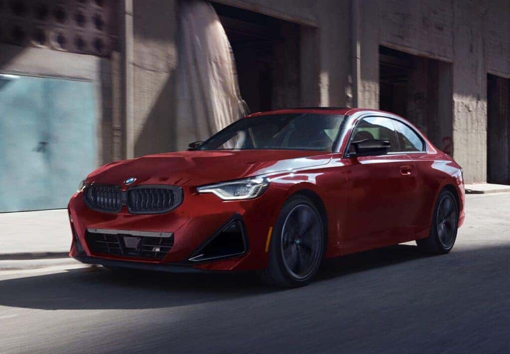 Exterior of a red 2025 BMW 2 Series Coupe in Wesley Chapel, Florida