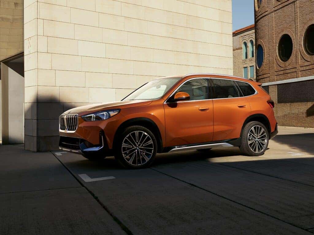 Exterior of an orange 2025 BMW X1 near Wesley Chapel
