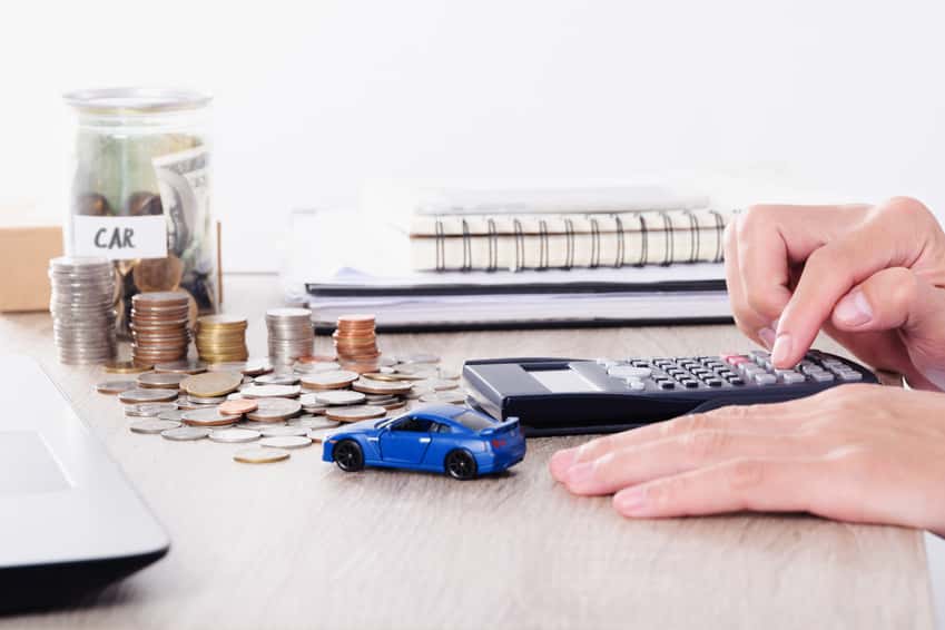 Calculating BMW financing with a toy car and coins