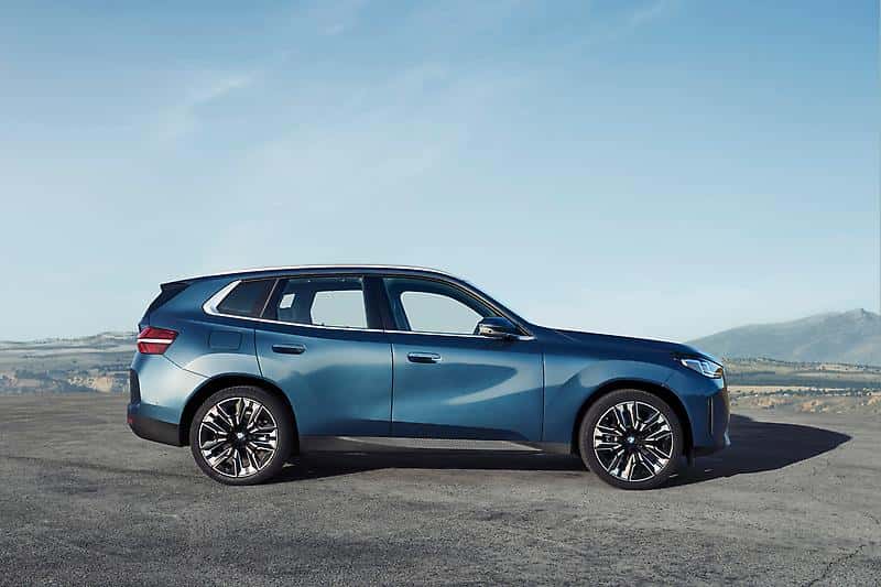 New BMW SUVs parked in a mountainscape