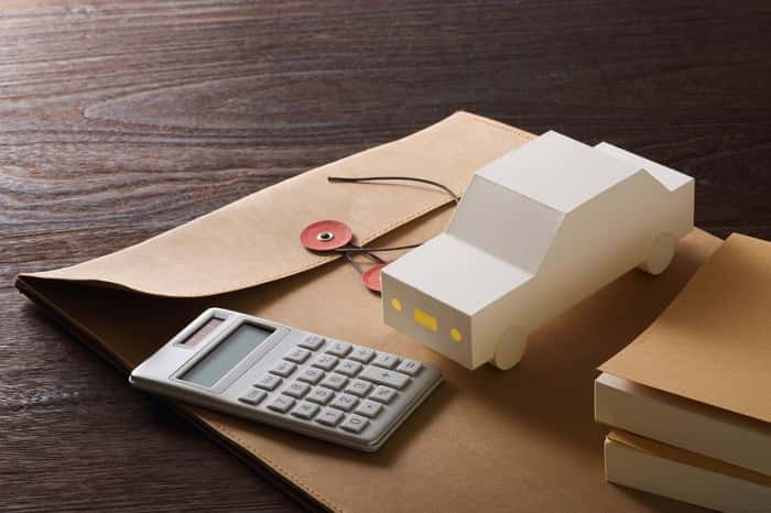 BMW financing rates documents and toy car