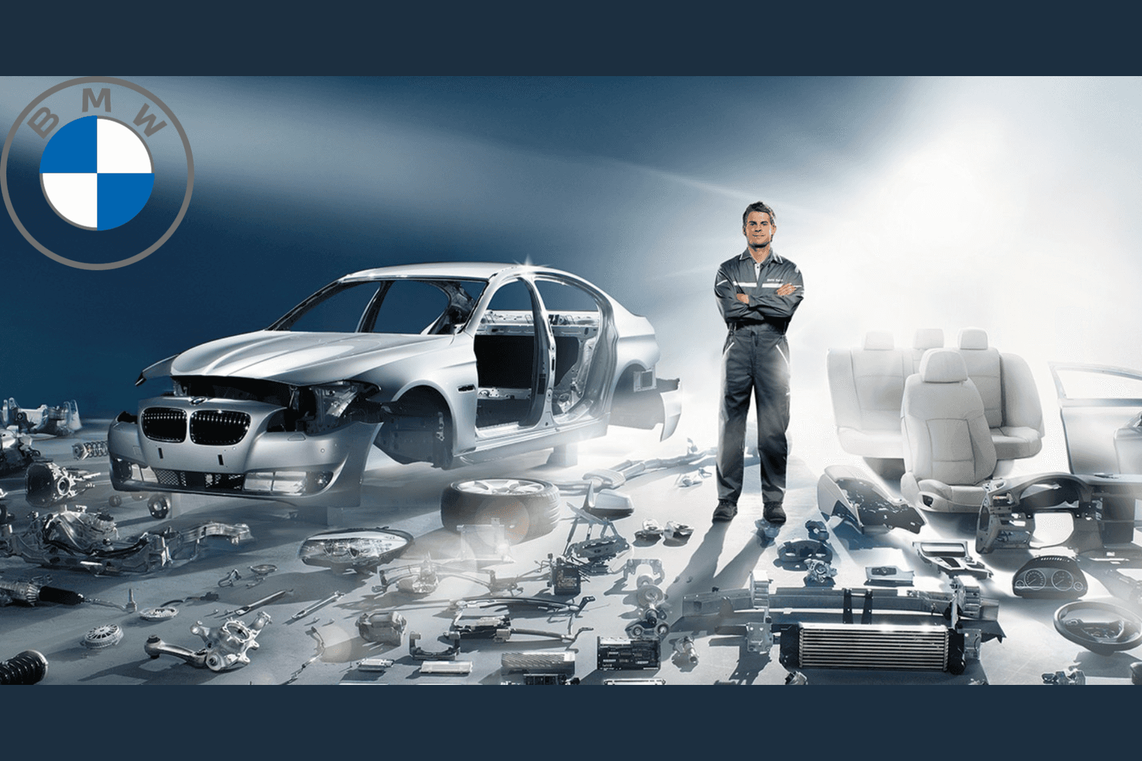 BMW Dinan parts laid out in front of a car
