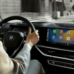 Driver behind the wheel of a vehicle equipped with BMW safety features