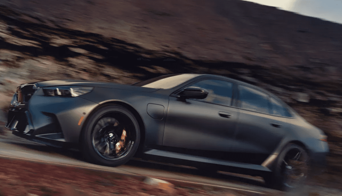 2027 Black BMW M5 Driving
