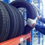 Service technician picking out new BMW tires