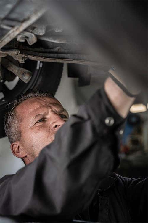 Mechanic Doing Radiator Repair