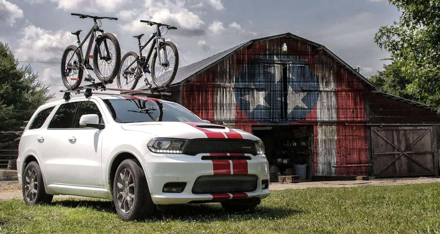 2019-dodge-durango-parked-in-front-of-shed