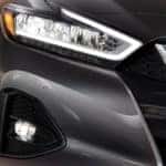 2020 Nissan Maxima sedan exterior closeup shot of headlights and grille