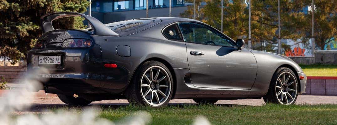 https://di-uploads-pod2.dealerinspire.com/carlblackautosuperstore/uploads/2020/02/Toyota-Supra-coupe-exterior-side-shot-with-gray-metallic-paint-color-and-rear-spoiler-attachment_b.jpg