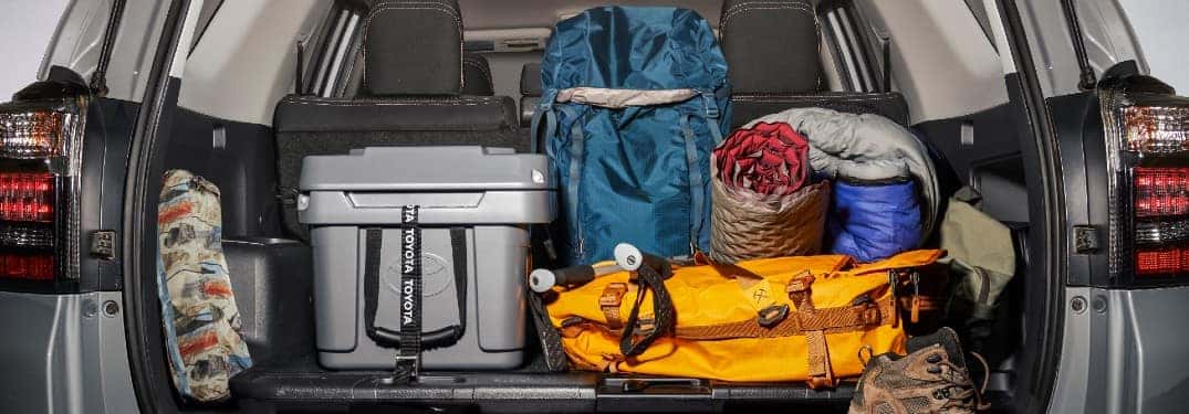 2021 Toyota 4Runner Trail Special Edition exterior shot of open and loaded trunk including an exclusive Toyota cooler