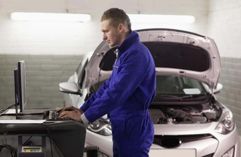 Mechanic working on a vehicle