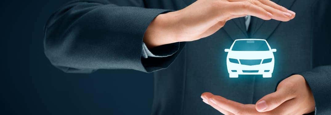 hands "holding" a car icon