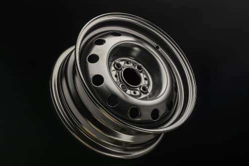 steel wheel on black background