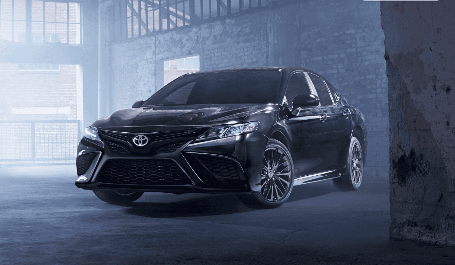 2021 Toyota Camry parked inside a warehouse