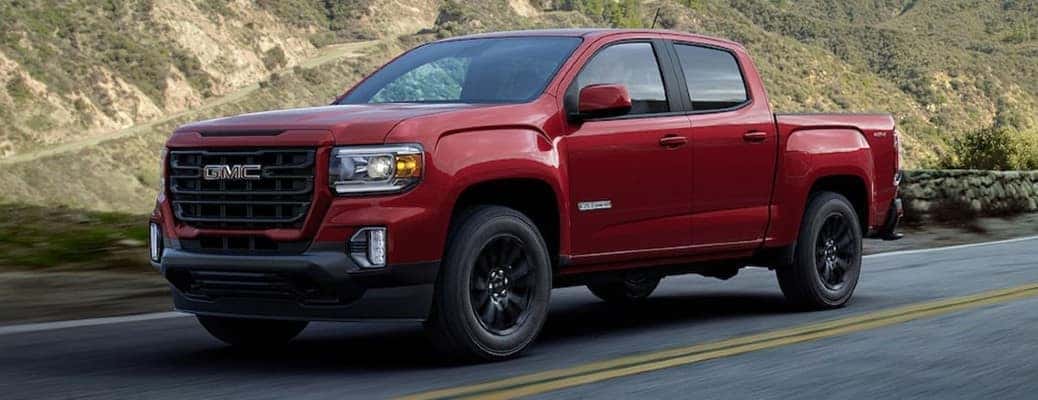 2021 GMC Canyon driving down a rural road