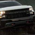 White 2022 Chevy Silverado ZR2 Driving in Mud