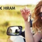 Woman in New Car with Car Keys and Carl Black of Hiram Logo