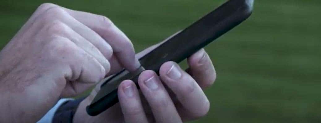 two hands holding a cell phone