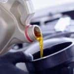 oil poured into a funnel