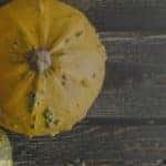 pumpkins on a wooden surface