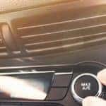 air conditioning vents with a hand