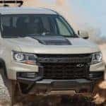 Chevrolet Colorado driving through sand