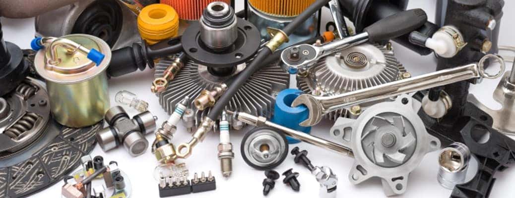 Vehicle parts and tools laid out together