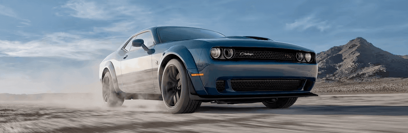 2023 Dodge Challenger front view in sand