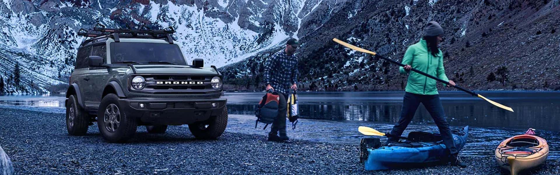 2023 Ford Bronco SUV at a camp by water