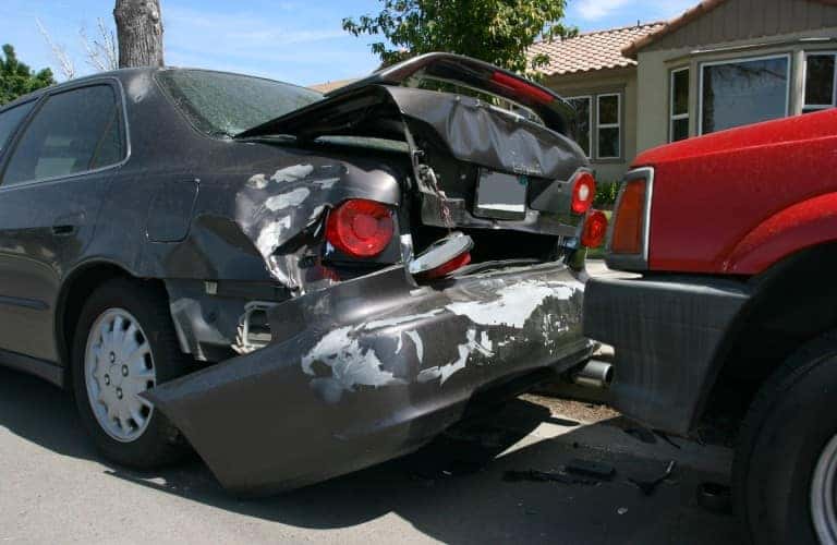 Two vehicles in a rear-end collision