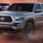 2019 Toyota Tacoma truck on sandy ground