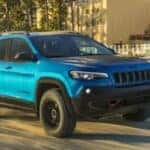 2020 Jeep Cherokee driving in a city