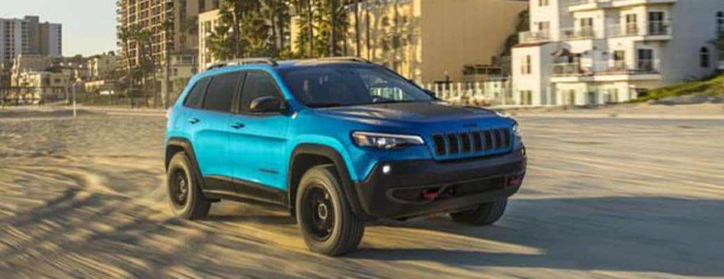 2020 Jeep Cherokee driving in a city