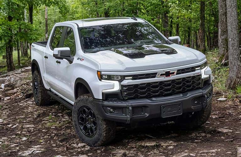 2023 Chevrolet Silverado 1500 driving in a forest