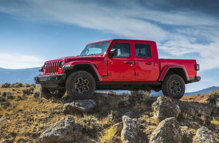 2020 Jeep Gladiator truck parked on rocks