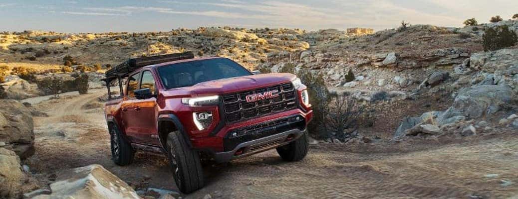 2024 GMC Canyon driving up a hill