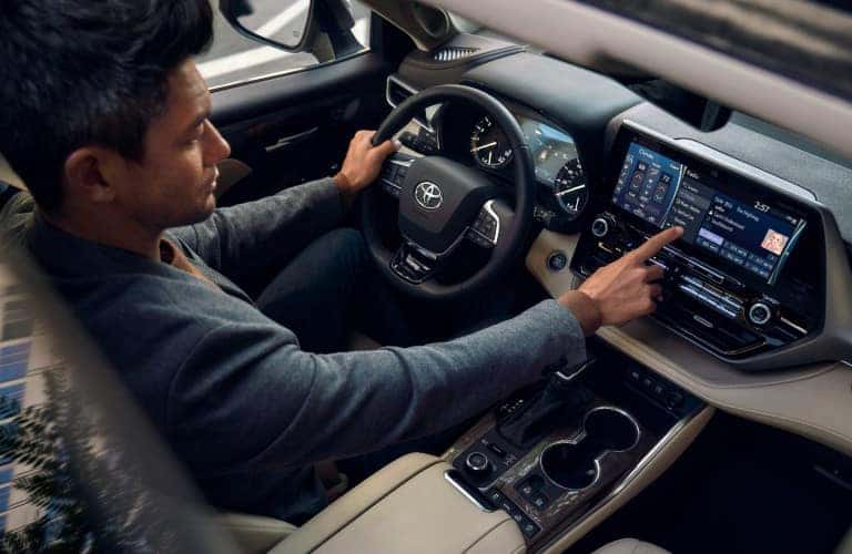 2021 Toyota Highlander with a driver interior view