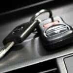 keys resting on a car's dashboard